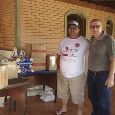 Entrega das arrecada��es do Natal de Prato Cheio